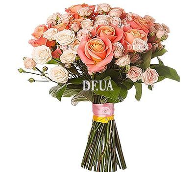 Shrubs cream-colored roses and ordinary roses