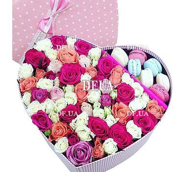 Macaroons in a box of flowers