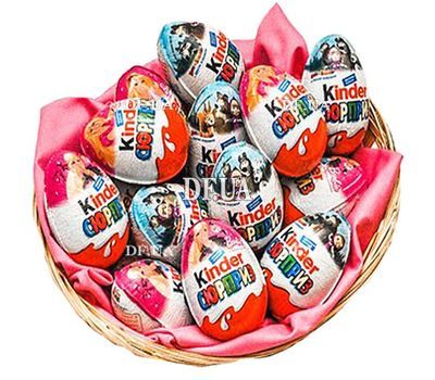 Eggs kinder surprise in the basket
