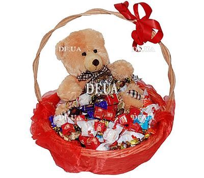 Basket with sweets and stuffed animals