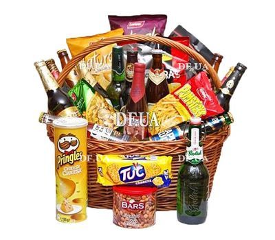 Basket with beer and nuts for men
