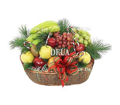 Fruit basket for the New Year with spruce branches