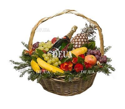New Year fruit basket with champagne