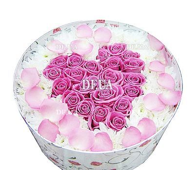 Heart of roses in a box with chrysanthemums