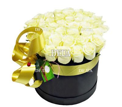 White roses in a black box