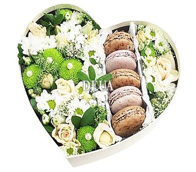 Box with flowers and macaroons