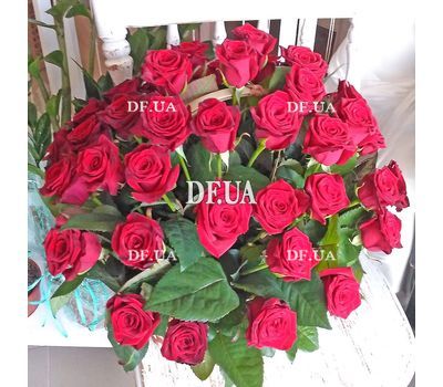 Red roses in a man's basket for an anniversary - view 3