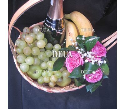 Basket of fresh flowers and fruits - view 1