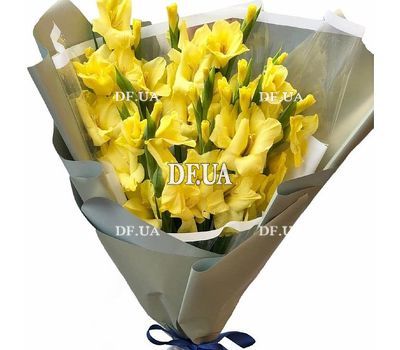 Beautiful bouquet of yellow gladiolus in a package