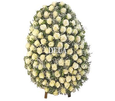 Funeral wreath of fresh flowers and greenery