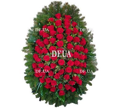 Funeral wreath of roses and thuja